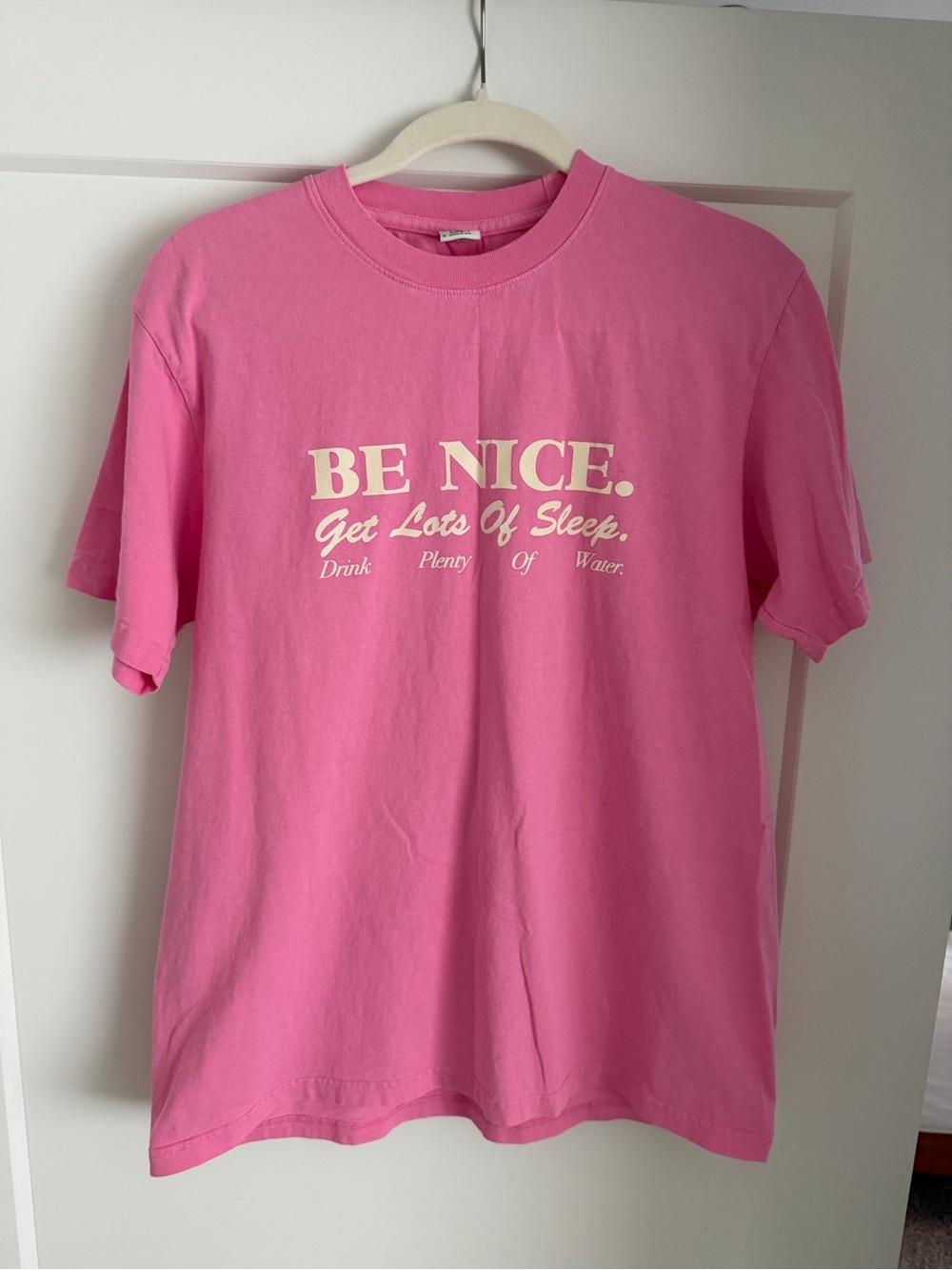 Sporty & Rich Pink "BE NICE" Short Sleeve Tee